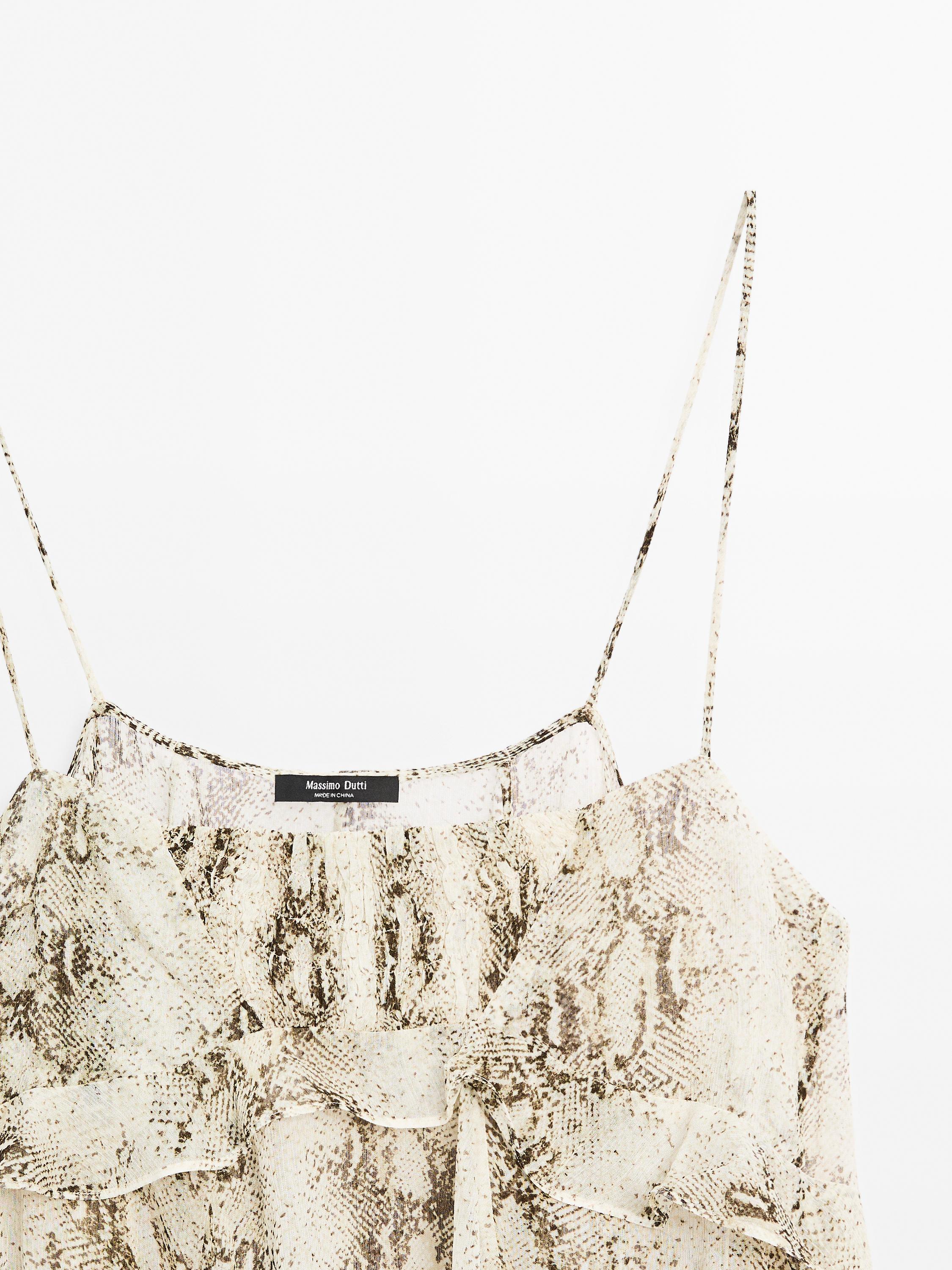 Ruffled snakeskin print top with gathered detail